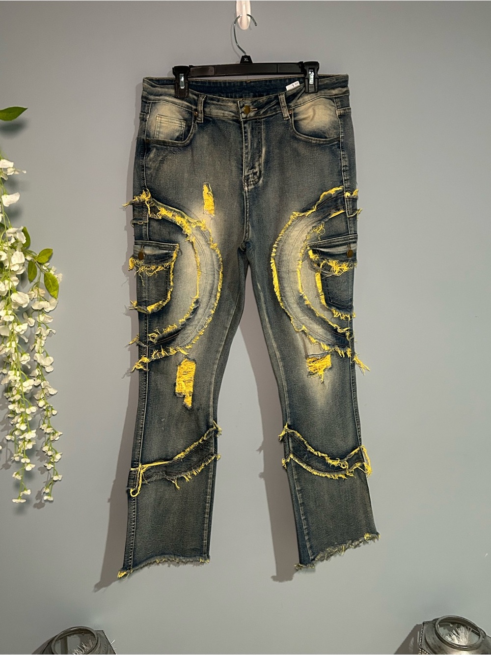 Men's Distressed Denim Jeans with Yellow Accent